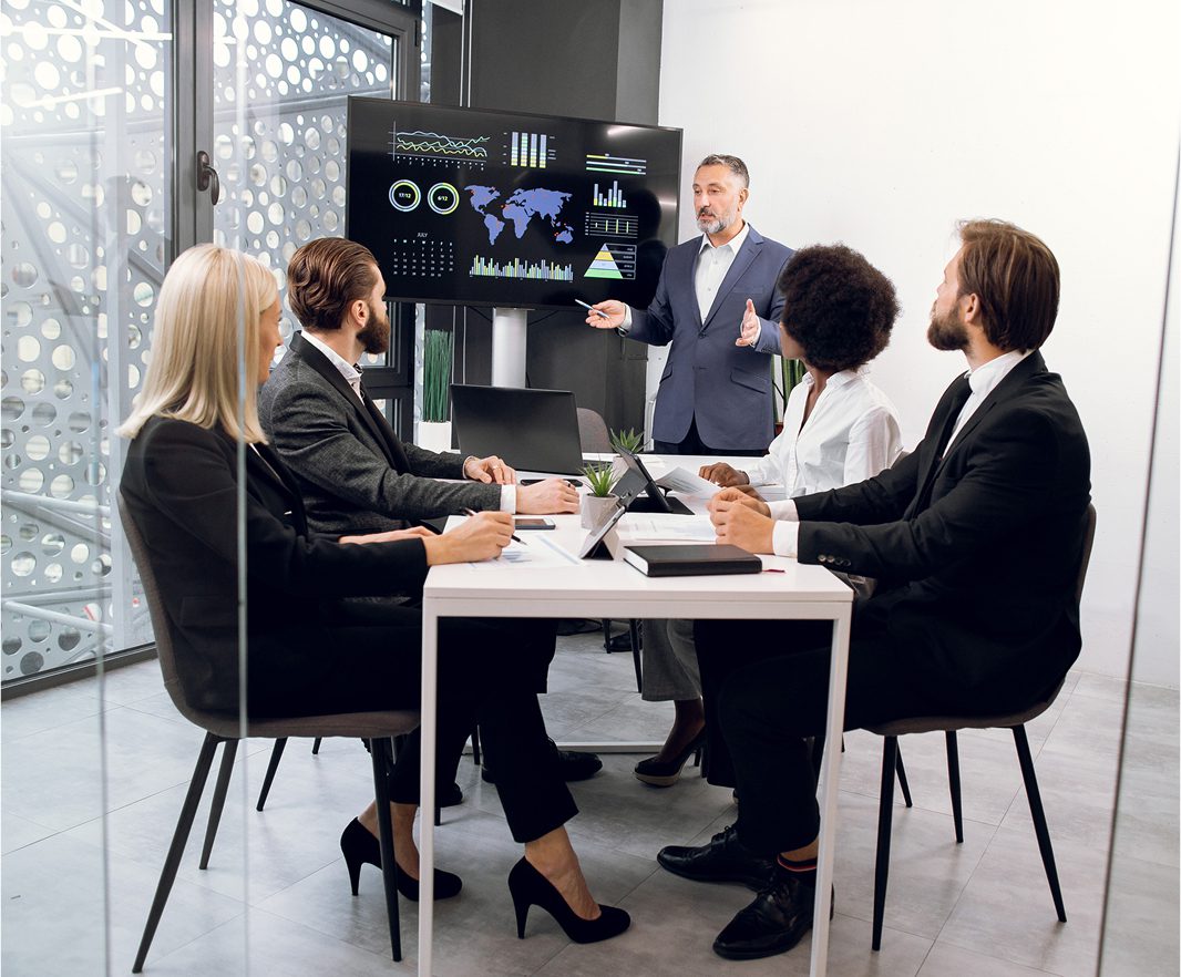 Business meeting with presentation and discussion.